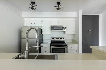 Kitchen with sink, appliancesat Los Feliz, California